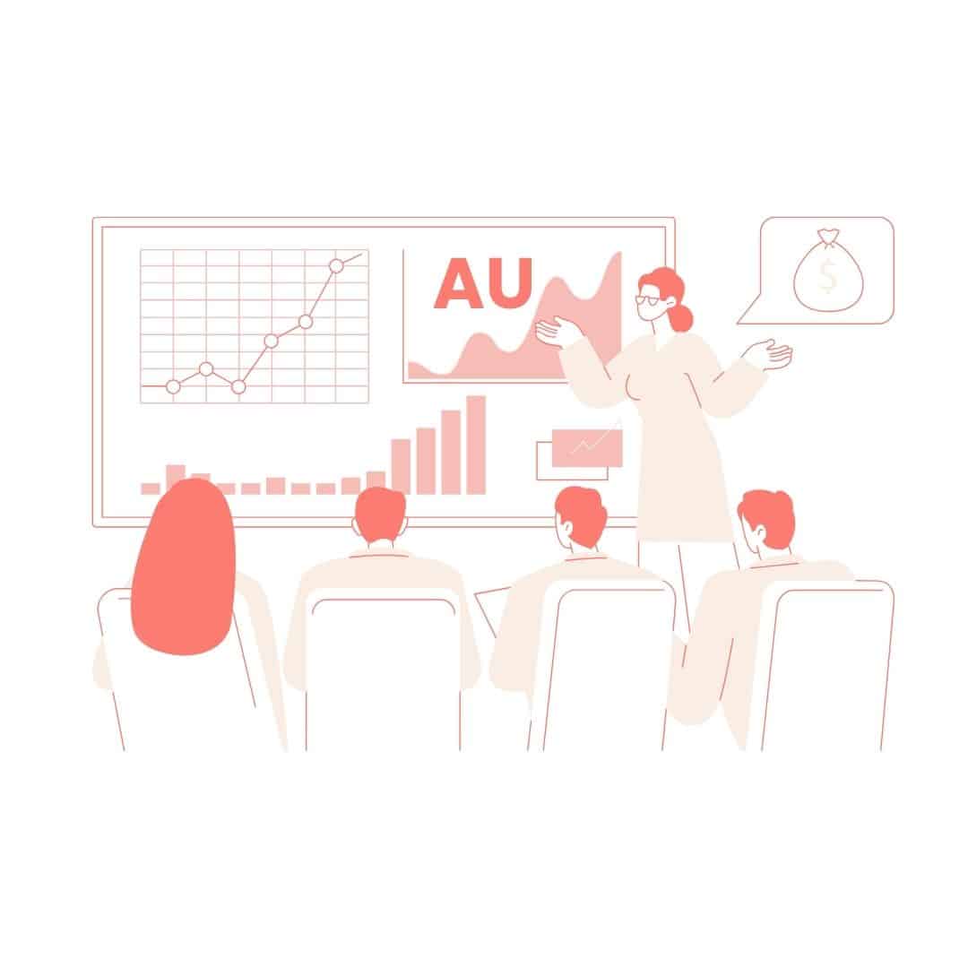 Presenter showing charts to a group in a conference room; AU on screen and a money bag in a speech bubble.